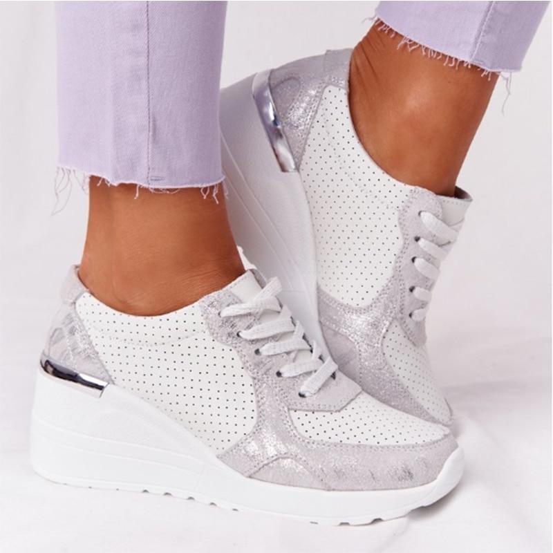 Women's lace-up wedge sneakers with perforated panels and metallic trims