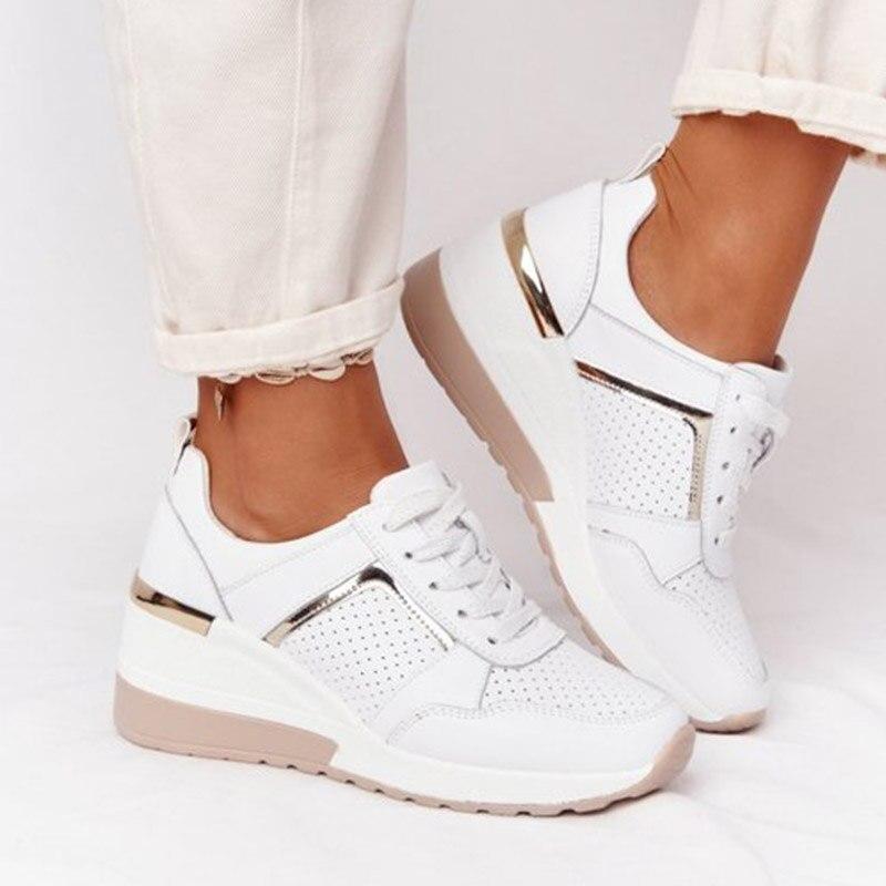 Women's lace-up wedge sneakers with perforated panels and metallic trims