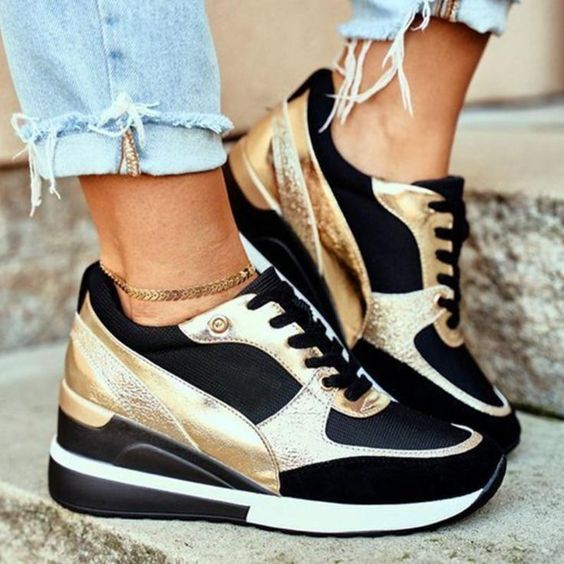 Women's lace-up wedge sneakers with perforated panels and metallic trims