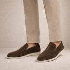Men's textured slip-on loafers with stitched almond toes and flat soles