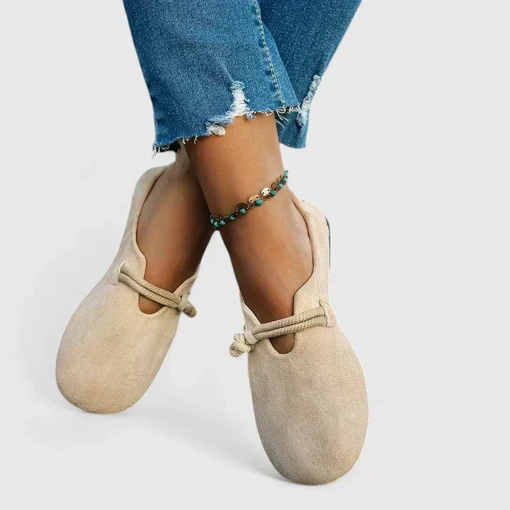 Women's slip-on loafers with rounded toes, rope trim and flat soles