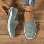 Women's textured slip-on sneakers with round toes and flat soles