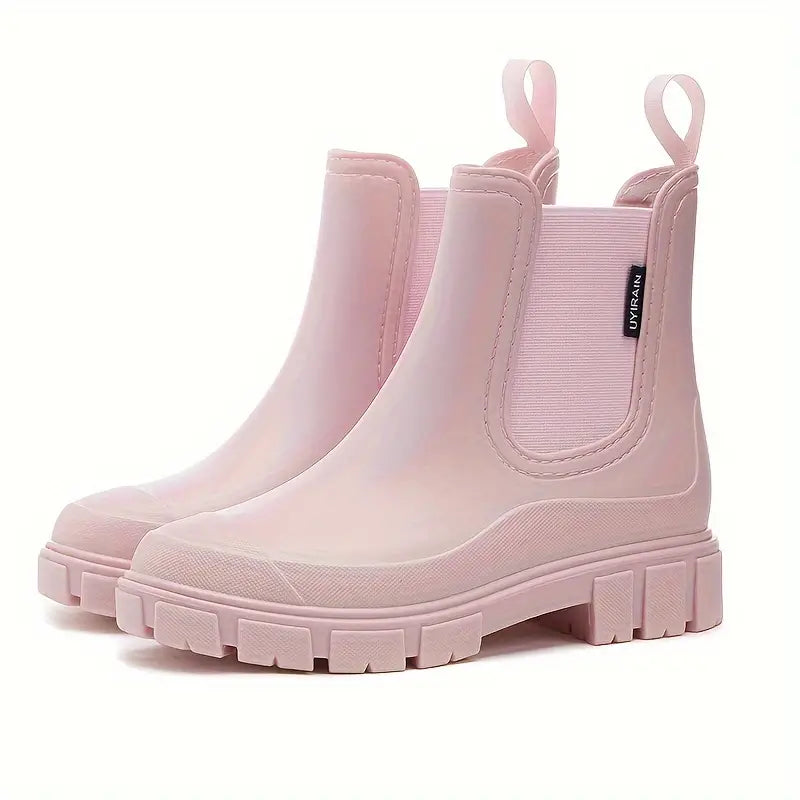 Women's Chelsea boots with elastic side panels and chunky textured soles