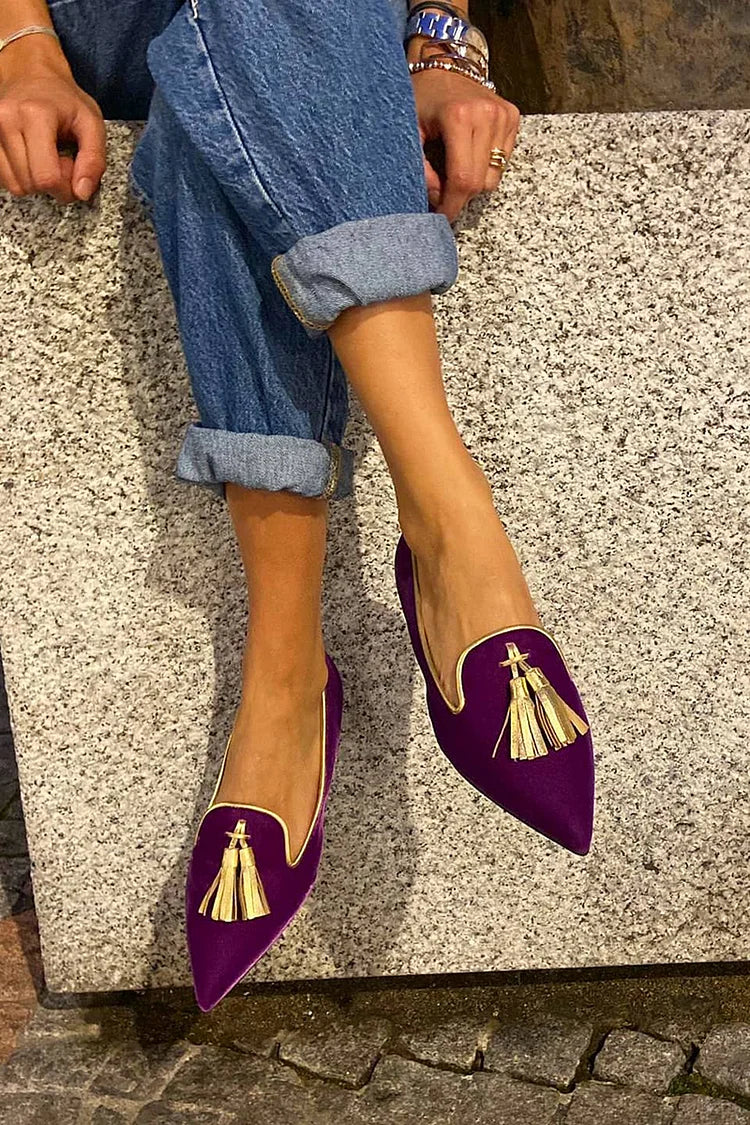 Pointed toe tassel loafers shown in purple and orange colourways