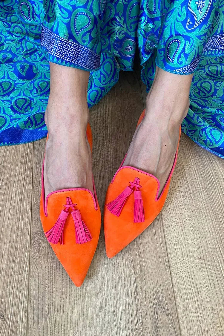 Pointed toe tassel loafers shown in purple and orange colourways