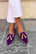 Pointed toe tassel loafers shown in purple and orange colourways