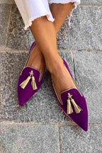 Pointed toe tassel loafers shown in purple and orange colourways