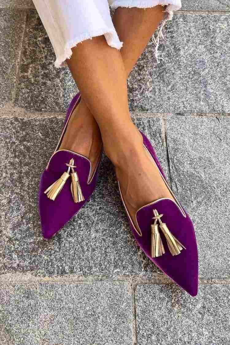Pointed toe tassel loafers shown in purple and orange colourways