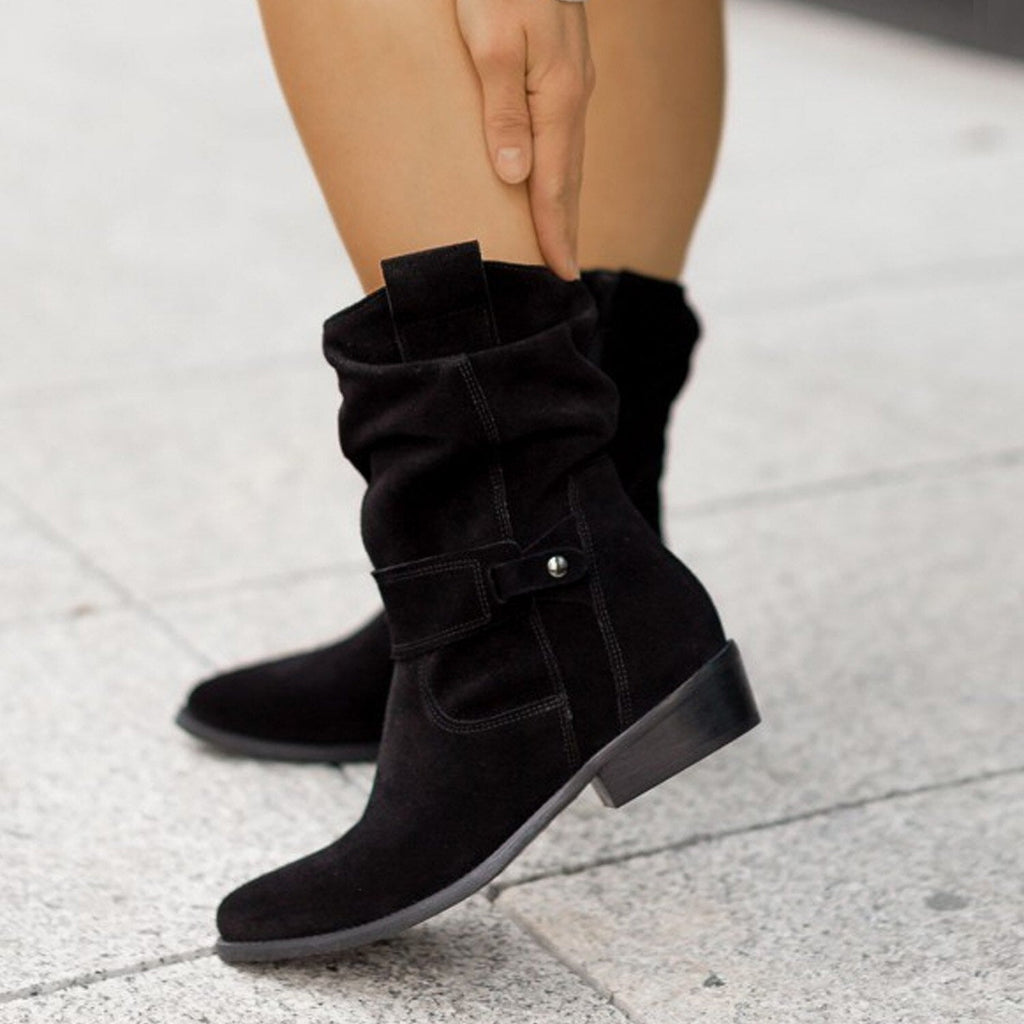 Women's slouch ankle boots with pointed toes, low heels and stitched strap detailing