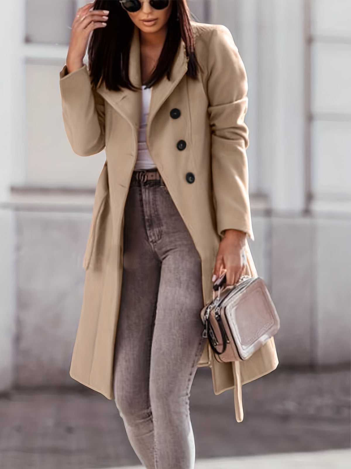 Women's khaki long trench coat with notched lapels and button front