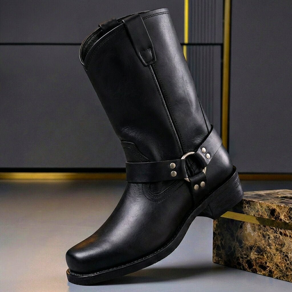 Tall biker boots with harness straps, metal studs and low block heels