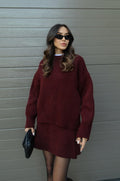 Women's knitted jumper and mini skirt set with long sleeves and crew neckline