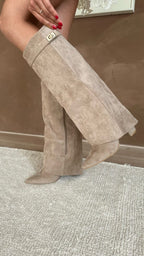 Women's knee-high pointed-toe boots with mid block heels, wide trim and buckle detail