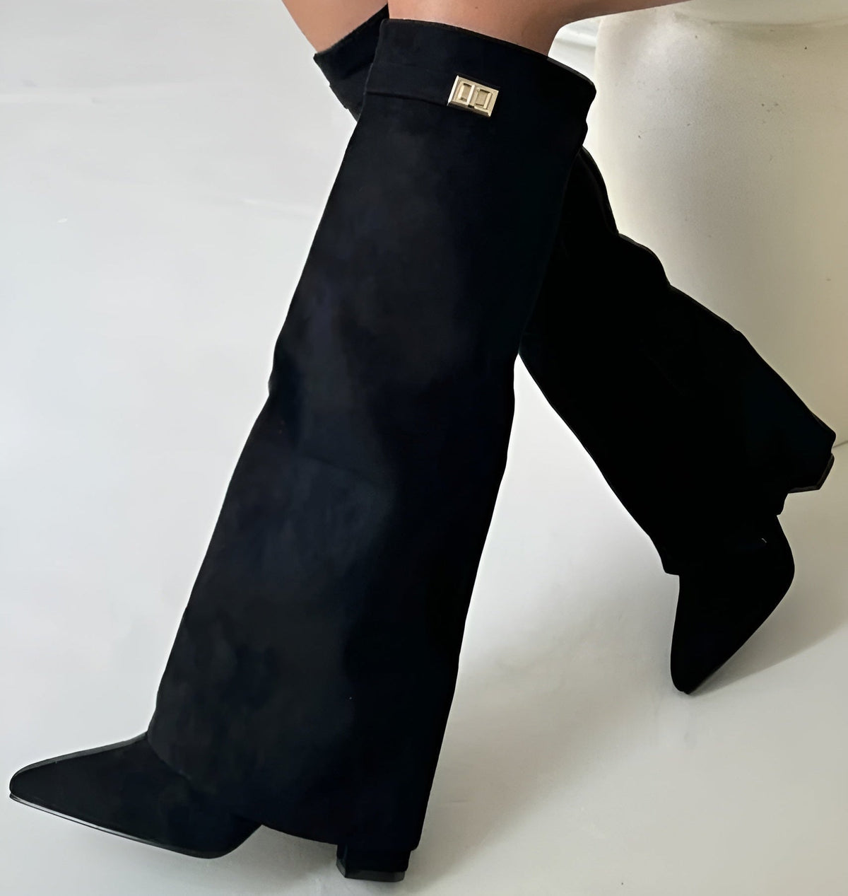 Women's knee-high pointed-toe boots with mid block heels, wide trim and buckle detail