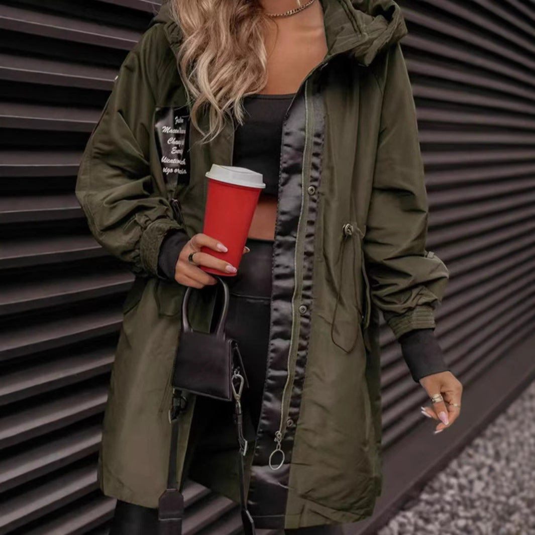 Women's olive green hooded mid-length parka coat with zip front and ribbed cuffs