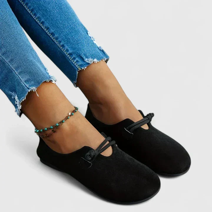 Women's slip-on loafers with rounded toes, rope trim and flat soles