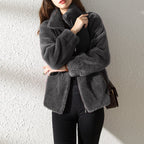 Women's plush fleece jacket with high collar, long sleeves and front zip