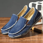 Casual slip-on loafers with rounded toes, stitched uppers and flat textured soles