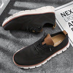 Textured lace-up trainers with rounded toe and flat white sole