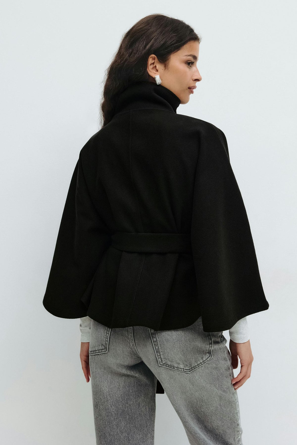 Women's cape coat with high collar, button front and tied waist belt