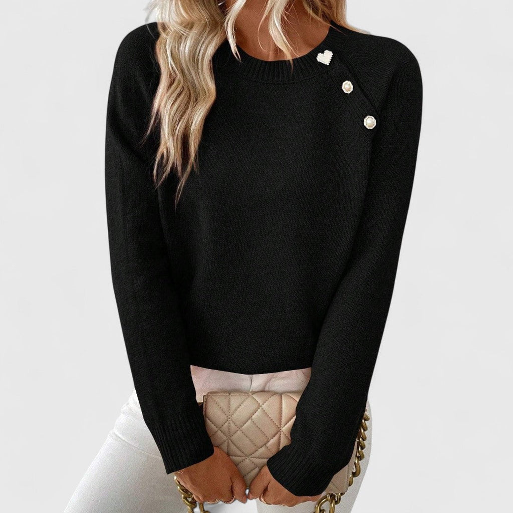 Women's crew neck knitted jumper with long sleeves and upper front button detail