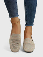 Women's rounded-toe woven slip-on flats with flat soles