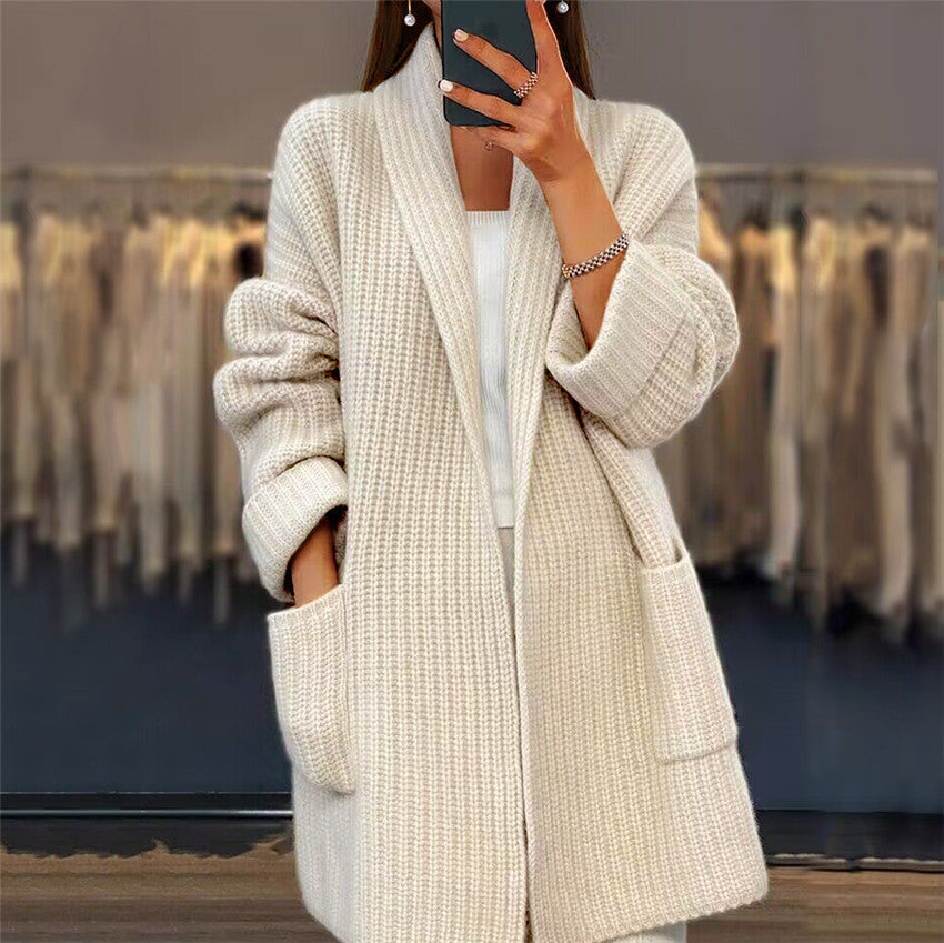 Women's longline textured knitted cardigan with open front, long sleeves and two front pockets