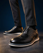 Men's wingtip brogue sneakers with perforated detailing and layered soles