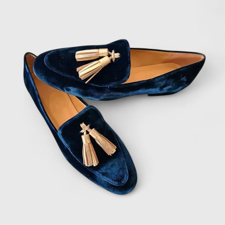 Women's dark blue almond-toe loafers with gold tassel details