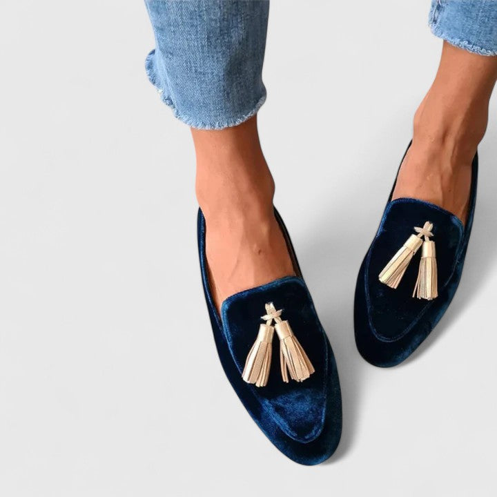 Women's dark blue almond-toe loafers with gold tassel details