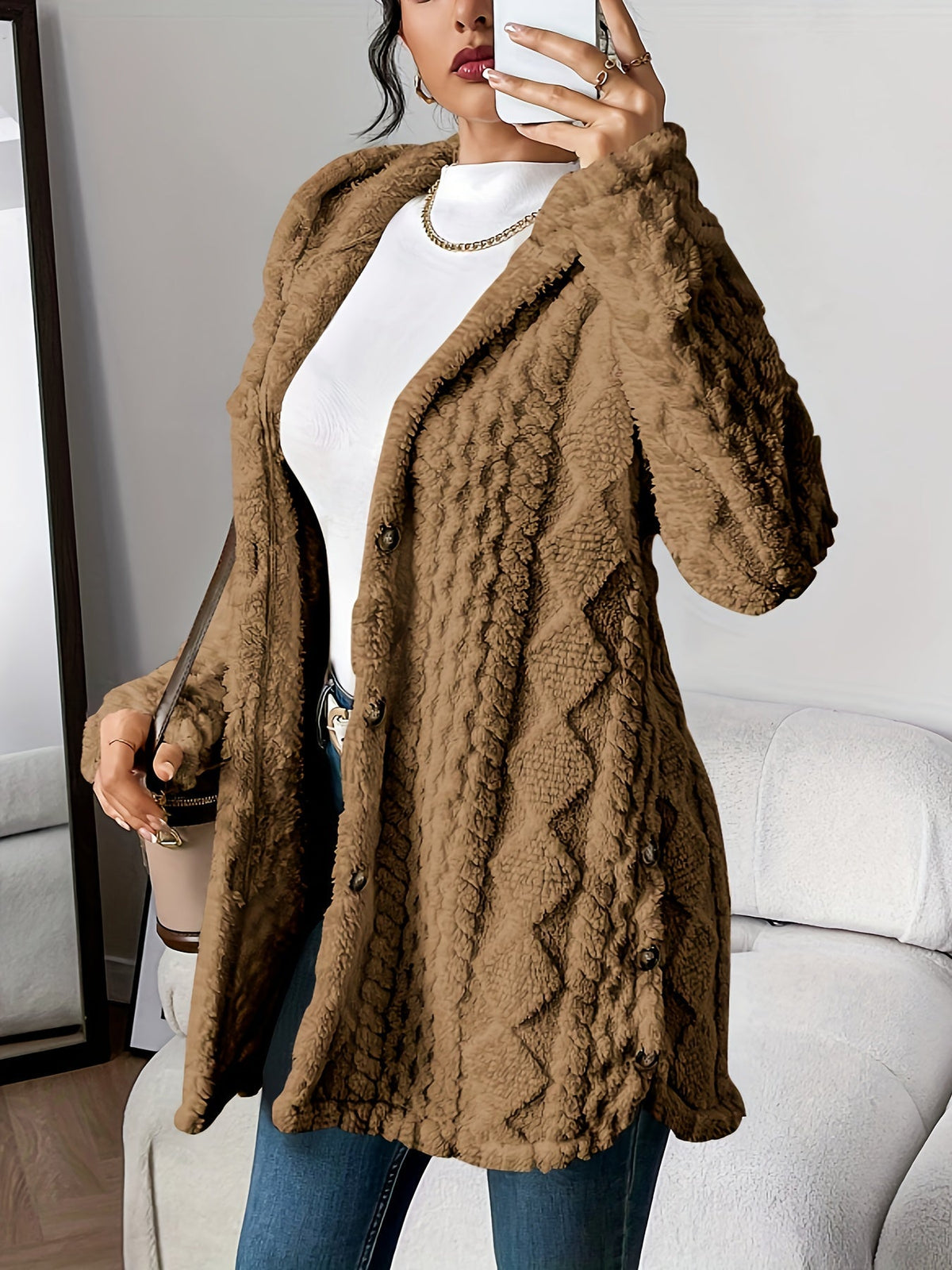 Women's hooded textured cardigan with long sleeves, button front and side pockets
