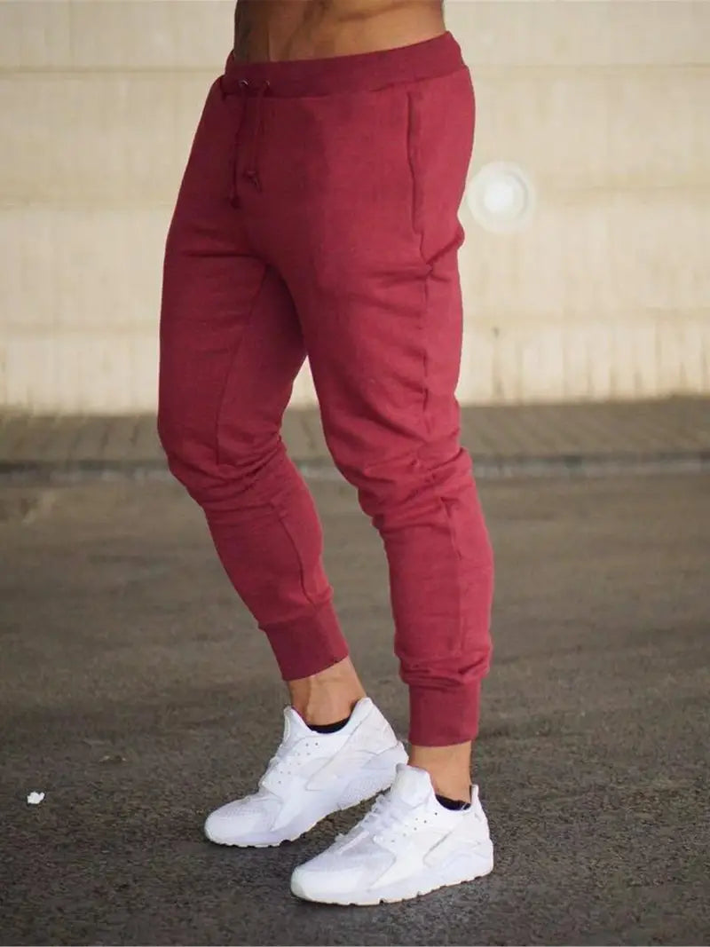Men's tapered jogger trousers with drawstring waist and cuffed ankles
