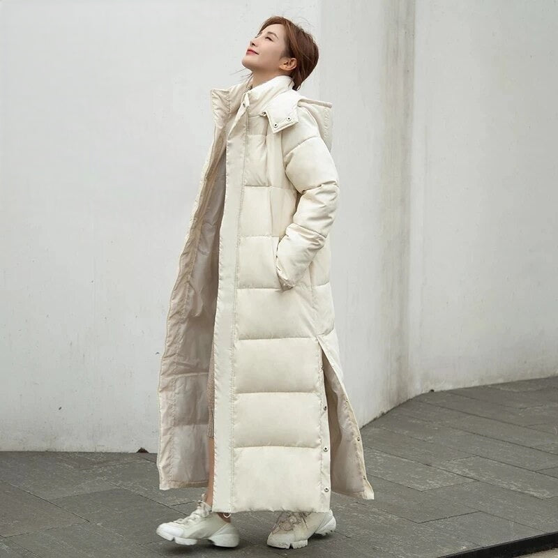 Women's long quilted puffer coat with hood and side pockets