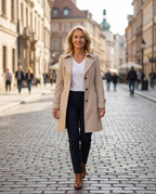 Women's longline trench coat with notched lapels, button front and cuff tabs