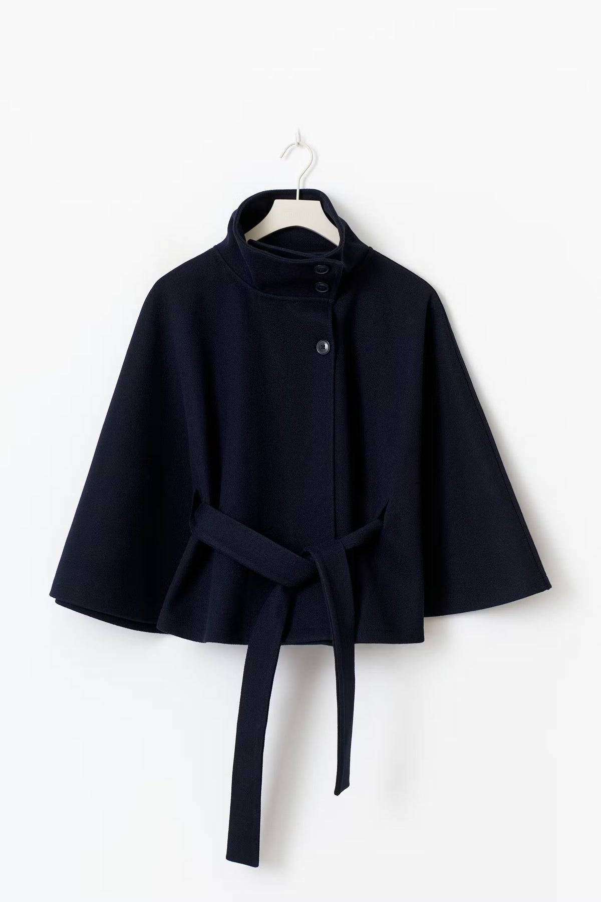 Women's cape coat with high collar, button front and tied waist belt