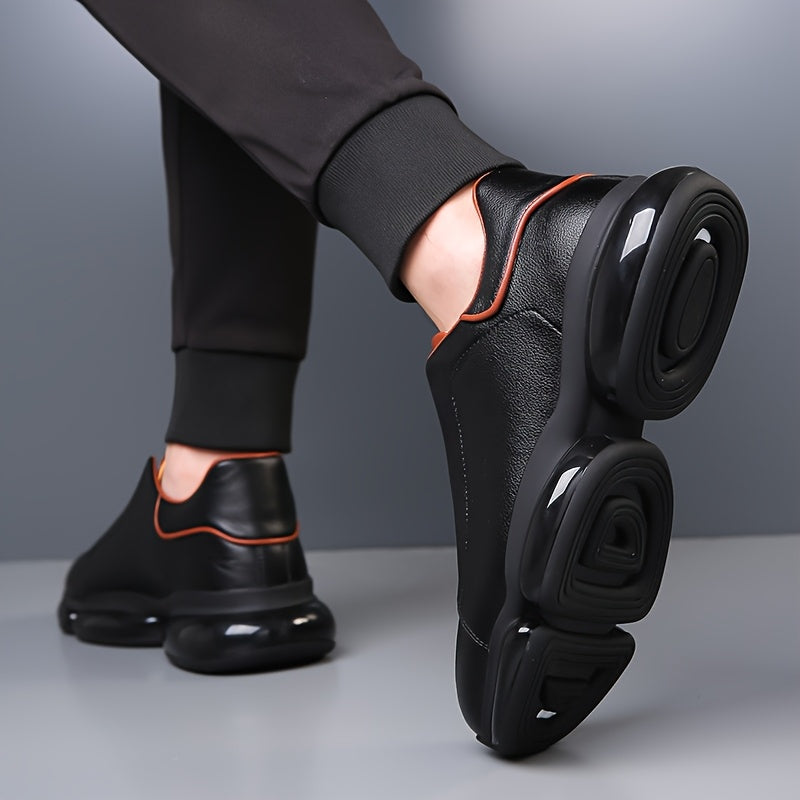 Black men's slip-on athletic trainers with chunky sculpted soles