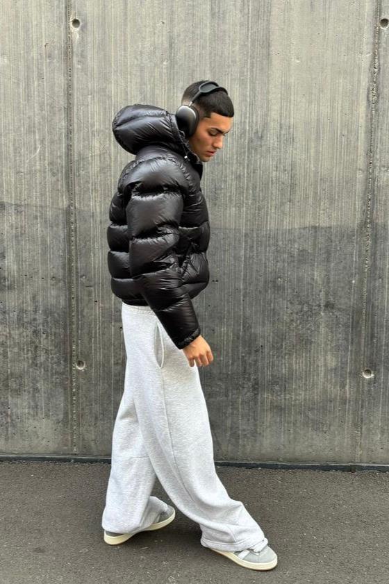 Men's hooded quilted puffer jacket with zip front and angled pockets