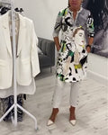 Women's grey long blouse with illustrated character print and button front