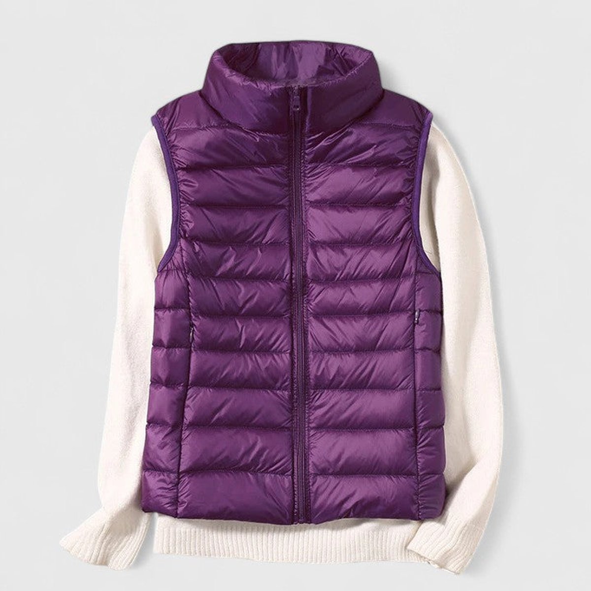 Women's sleeveless quilted puffer gilet with high collar and zip front
