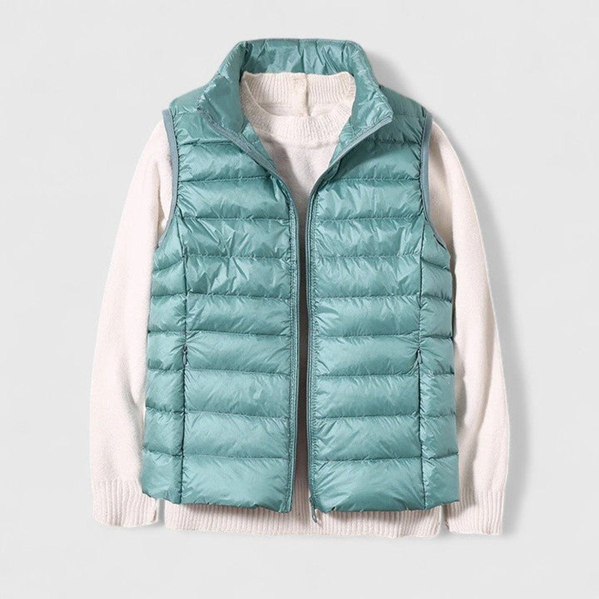 Women's sleeveless quilted puffer gilet with high collar and zip front