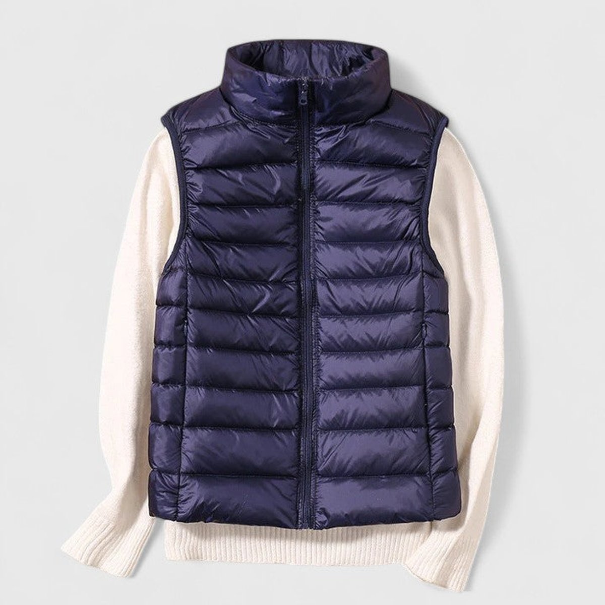 Women's sleeveless quilted puffer gilet with high collar and zip front