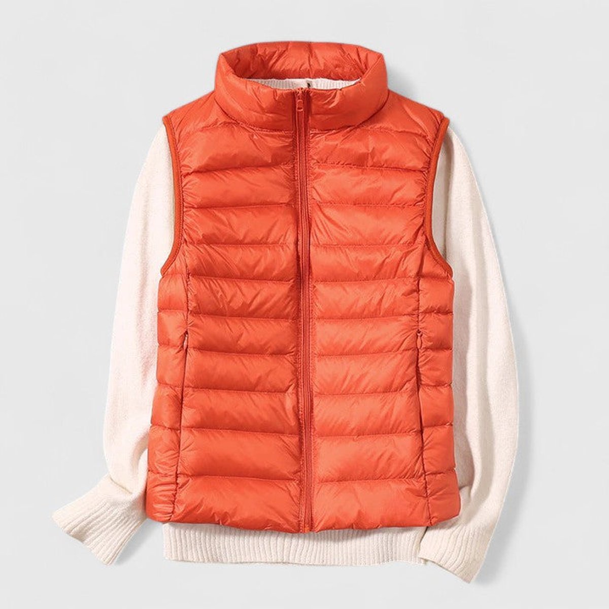 Women's sleeveless quilted puffer gilet with high collar and zip front