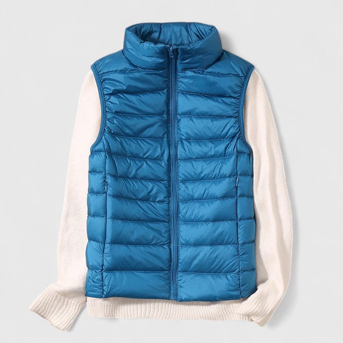 Women's sleeveless quilted puffer gilet with high collar and zip front