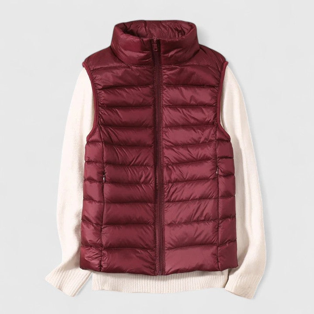 Women's sleeveless quilted puffer gilet with high collar and zip front