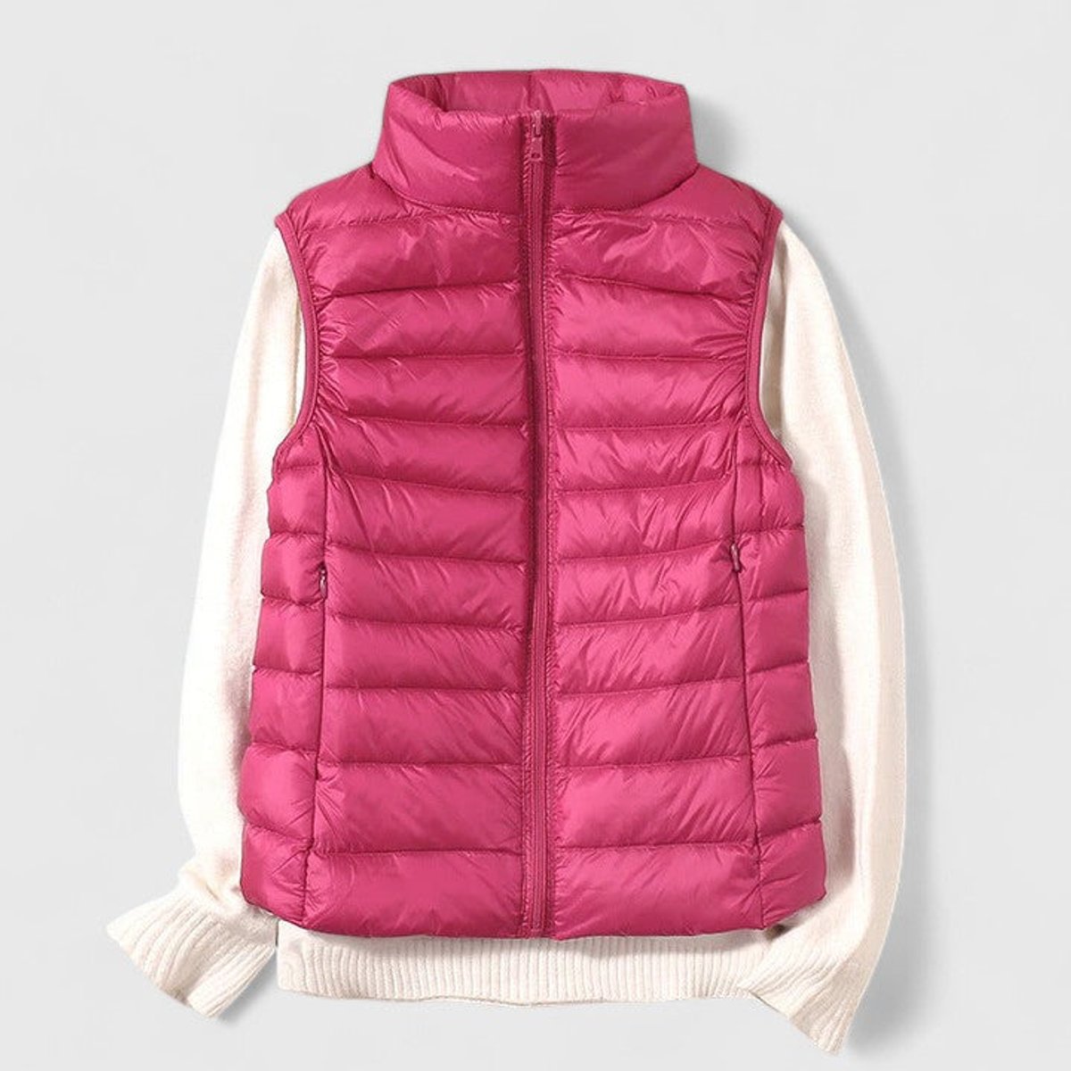 Women's sleeveless quilted puffer gilet with high collar and zip front