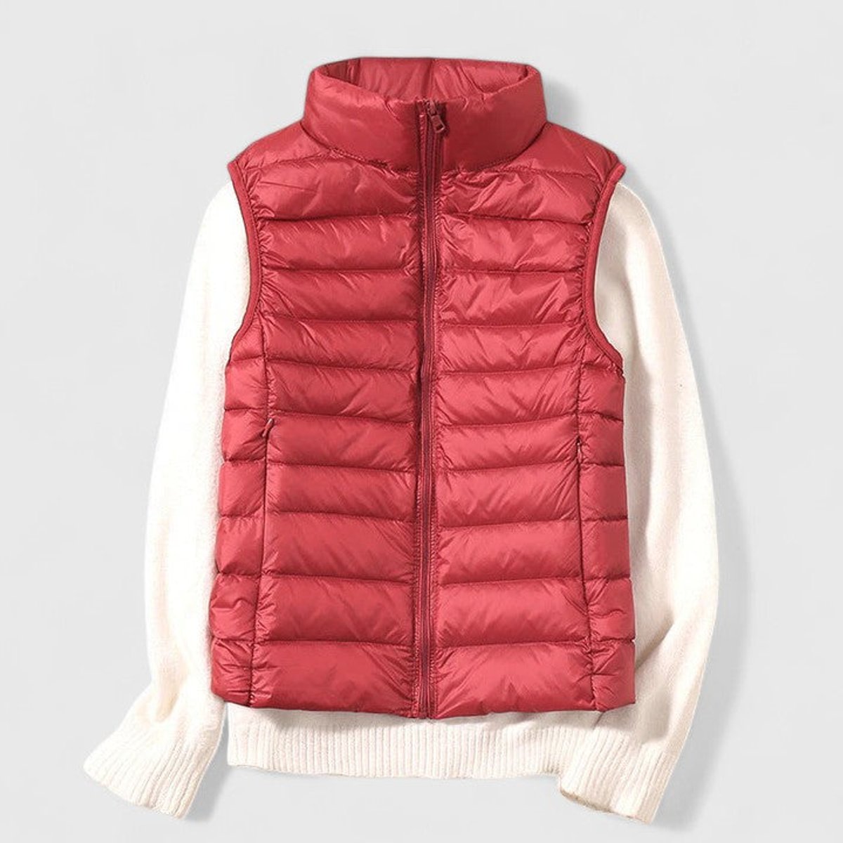 Women's sleeveless quilted puffer gilet with high collar and zip front