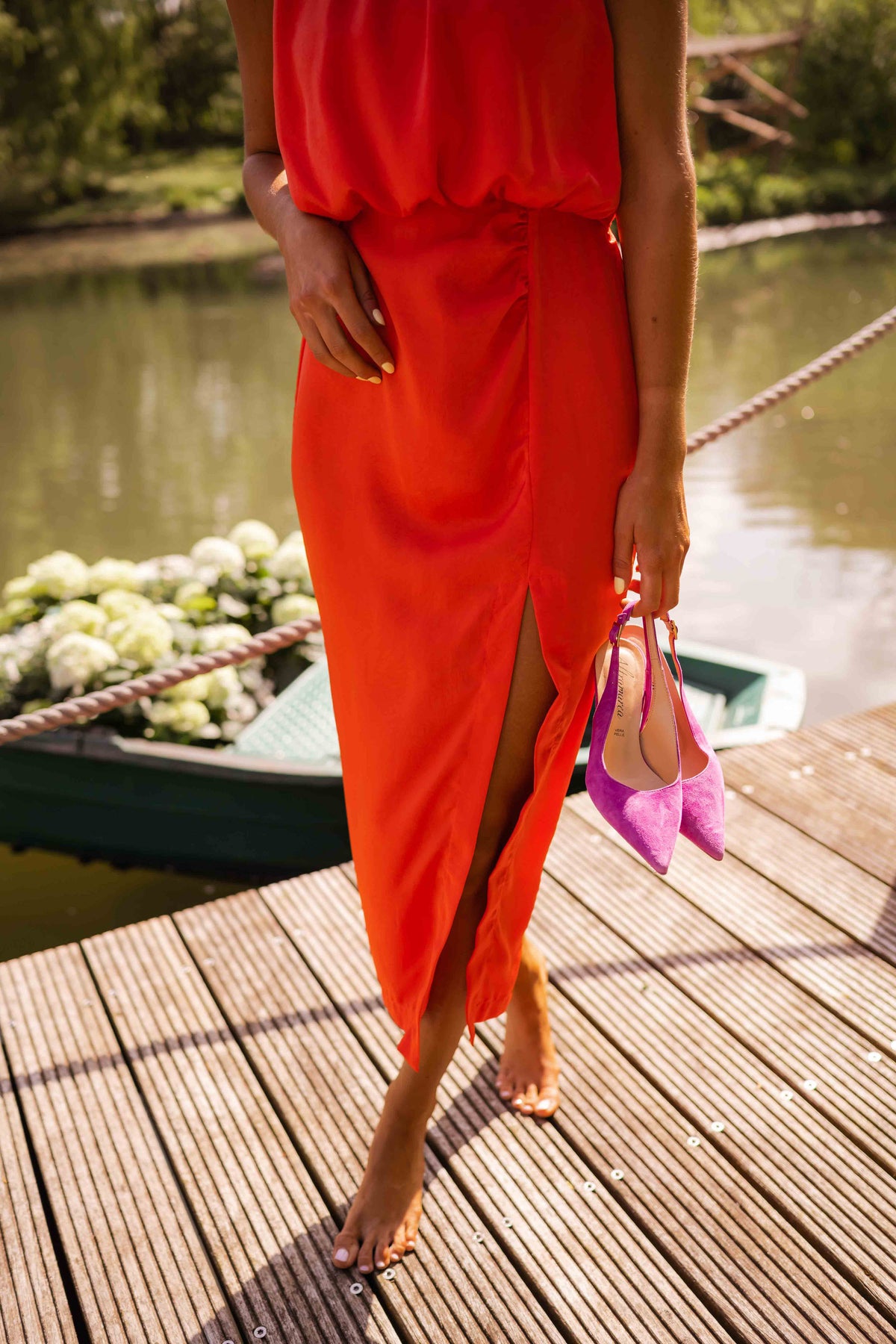 Women's sleeveless halter midi dress with gathered neckline and front side slit