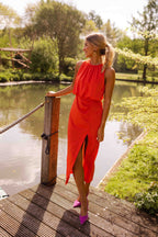 Women's sleeveless halter midi dress with gathered neckline and front side slit