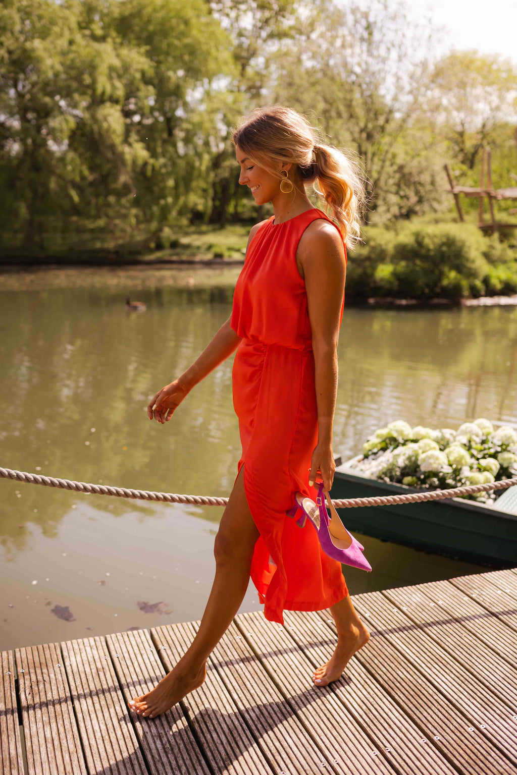 Women's sleeveless halter midi dress with gathered neckline and front side slit