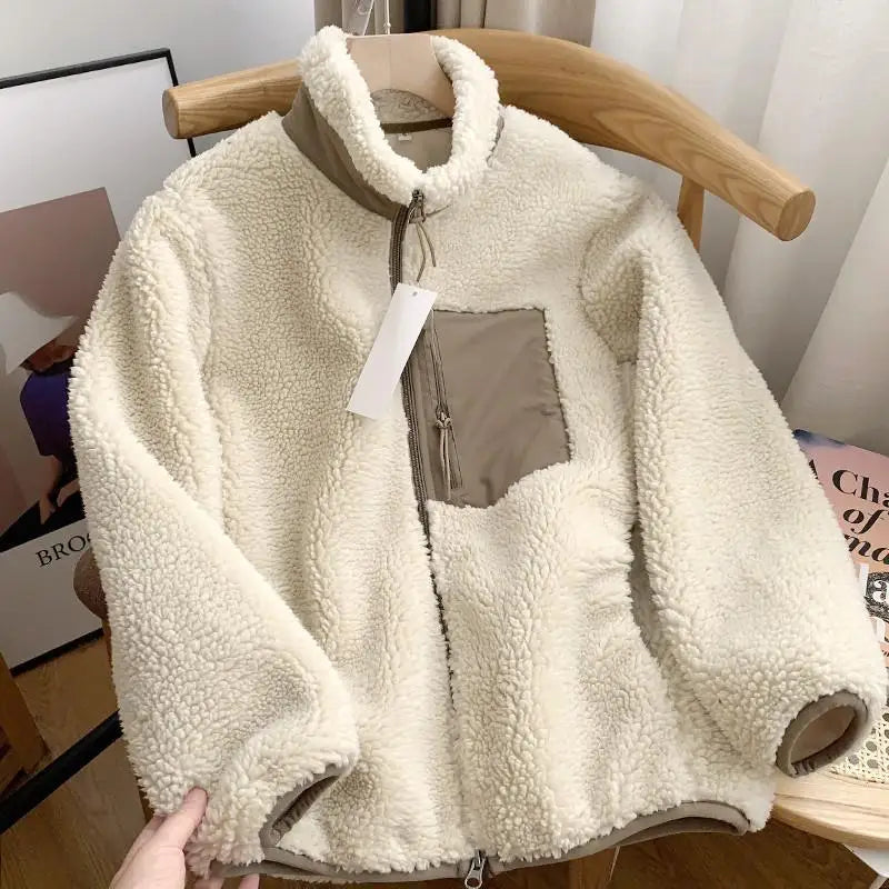 Women's sherpa fleece jacket with high collar, front zip and chest pocket